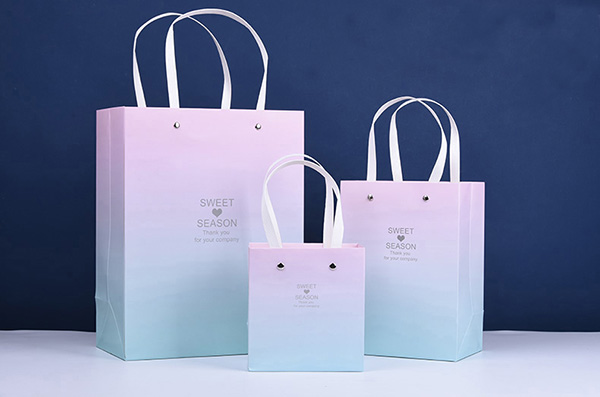 成都手提袋制作常用的手提繩樣式及優(yōu)缺點